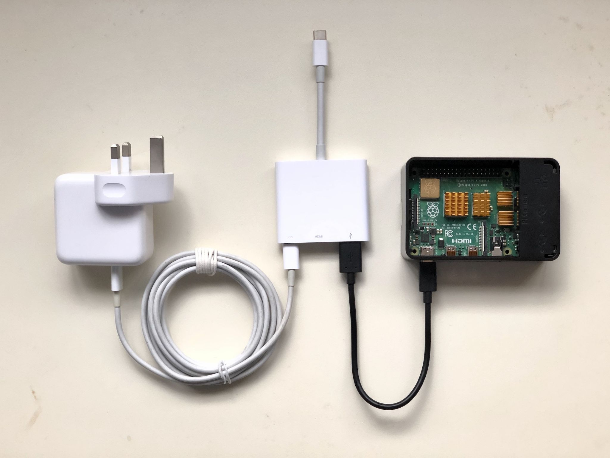 Using the Apple USB-C connector to charge the iPad Pro and access the Pi4 at the same time